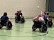 Foto: Schüler*innen in Rollstühlen spielen Rollstuhl-Rugby